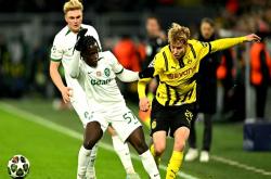 雷速体育比分官网-多特蒙德战胜沙尔克04，保持不败势头